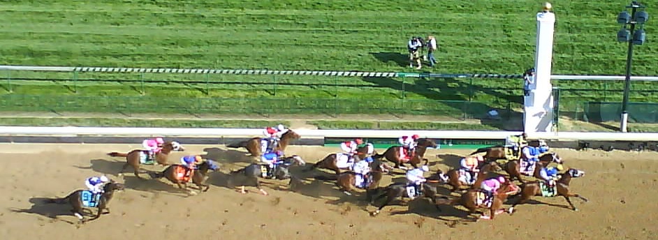 Horses crossing the finish line